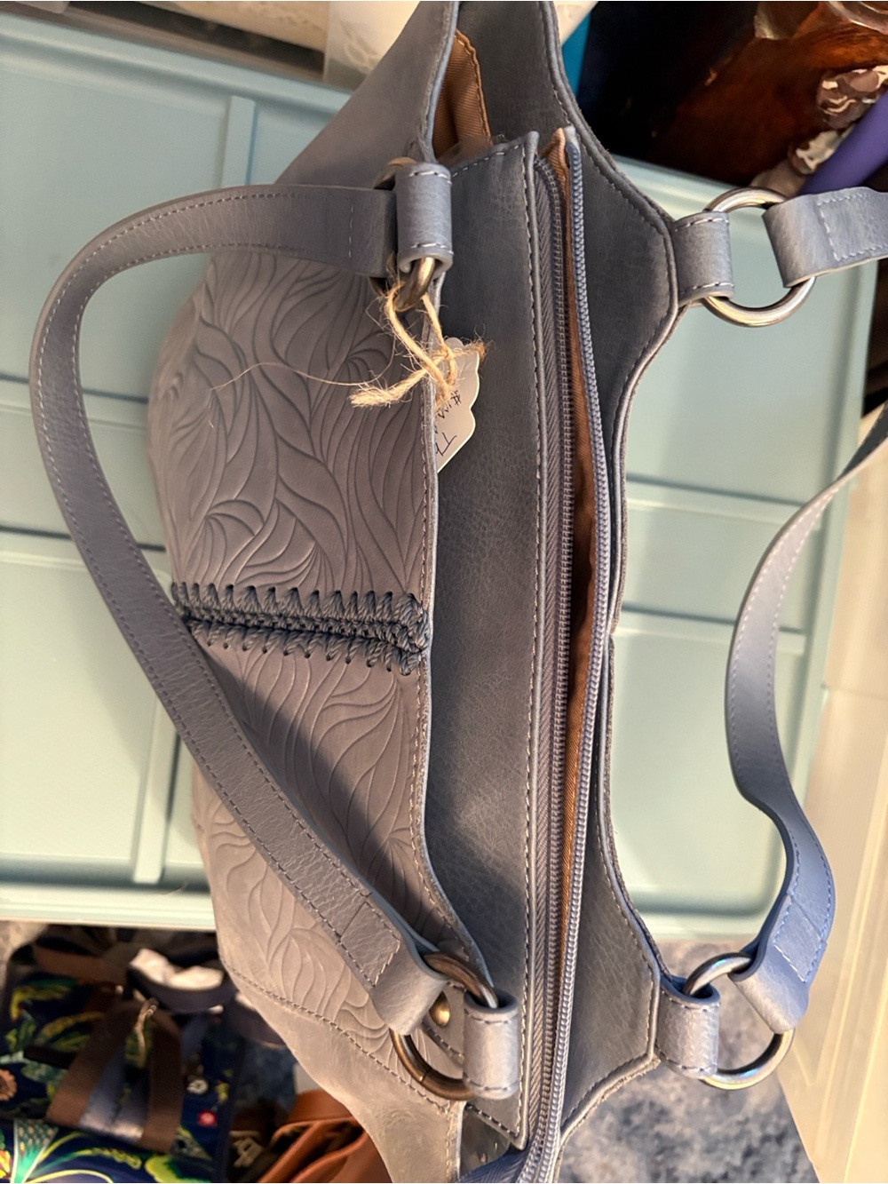 The Sak Embossed Tote in Dusty Blue Bolinas Tote
16.5 L
10 H
4 W